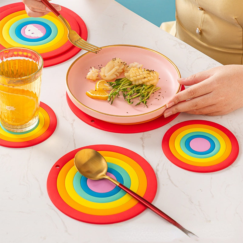 https://rainbowlocker.com/cdn/shop/products/Round-Rainbow-Heat-Resistant-Silicone-Mat-Drink-Cup-Coasters-Non-slip-Pot-Holder-Table-Placemat-Kitchen_1200x.jpg?v=1660336450